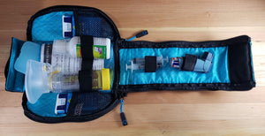 interior of insulated medical bag showing how it can hold medicine, instructions and epinephrine.